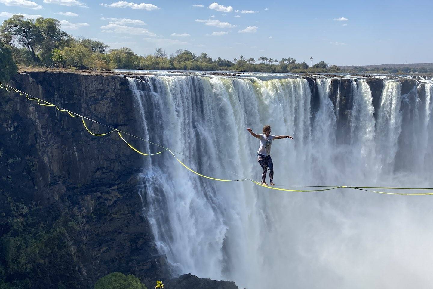 Antonia highlining across Victoria Falls